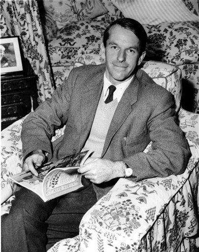 In this Oct. 28, 1958 file photo, Dr. Frederick Sanger, research Biochemist at Cambridge University, poses in his home in Cambridge, England. British biochemist Frederick Sanger, who twice won the Nobel Prize in chemistry, has died, the Wellcome Trust Sanger Institute said Wednesday Nov. 20, 2013. He was 95. Sanger first won the Nobel Prize in 1958 for his work determining the sequence of the amino acids in insulin and showing how they are linked together, and in 1980 he won a second Nobel Prize relating to his development of a technique to sequence human DNA. (AP Photo, File)